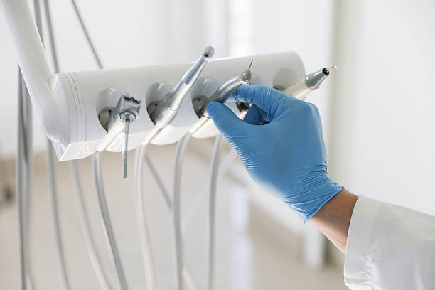 Professional Tooth Extraction technician working in White Oak, TX
